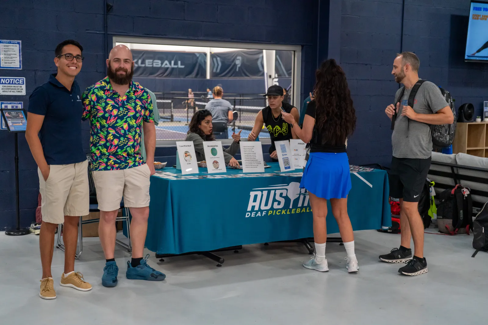 Players at the Austin Deaf Pickleball check-in table at Pickleland