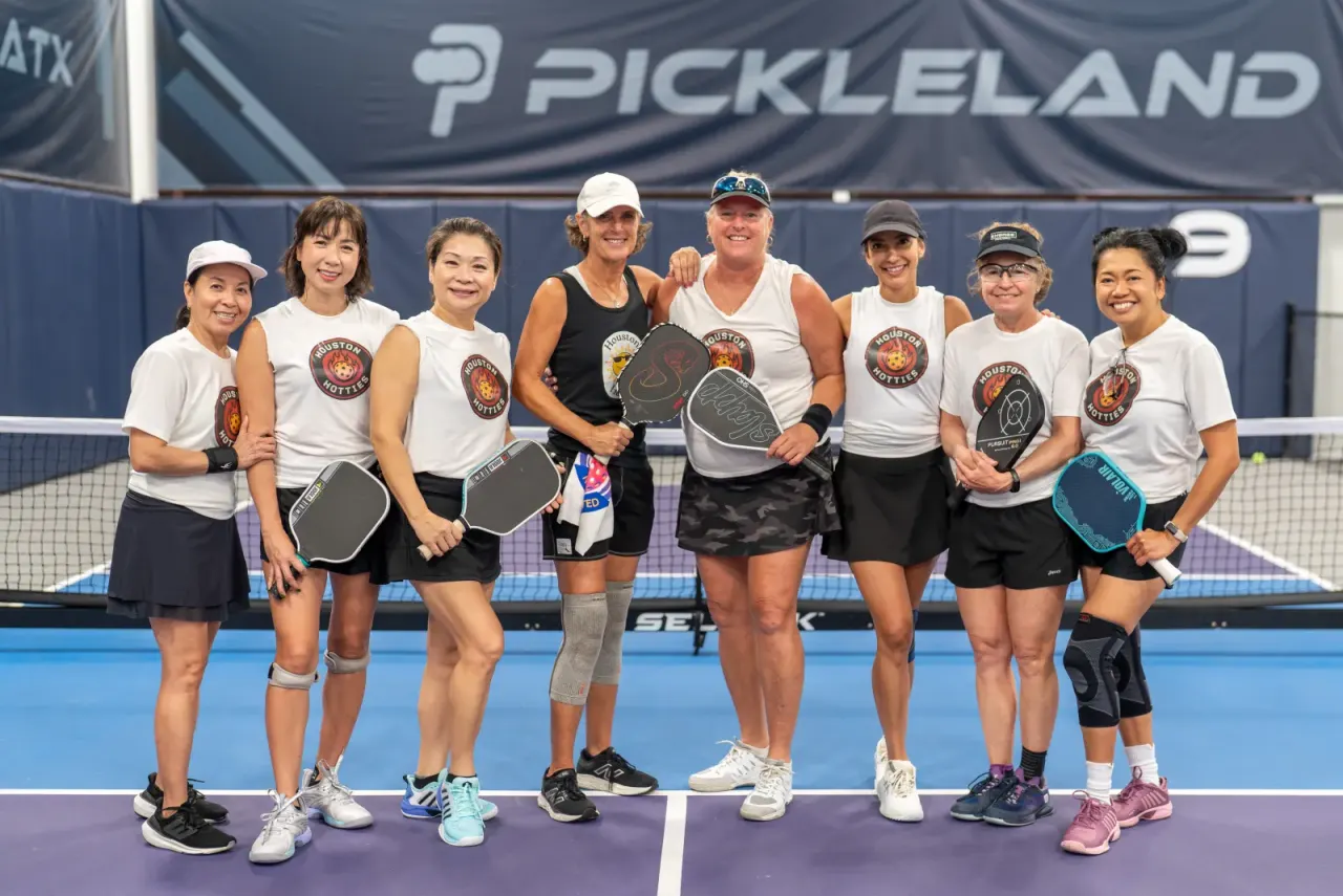 Women's league team group photo on court