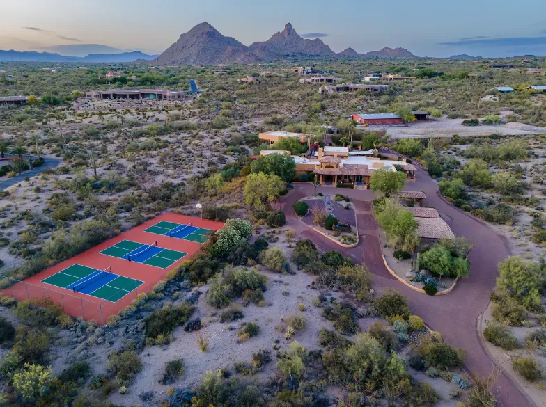 Pickleball Paradise Scottsdale desert home with an outdoor pickleball court and heated pool