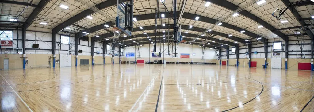 Indoor courts and lounge area at the West Austin Athletic Club