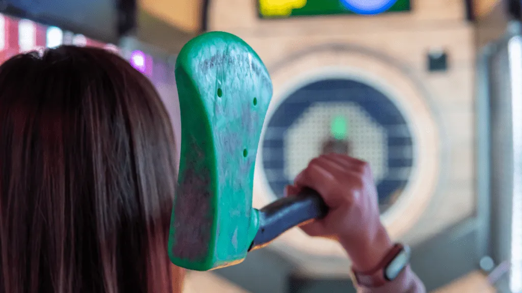 Axe throwing at an indoor target range in Austin