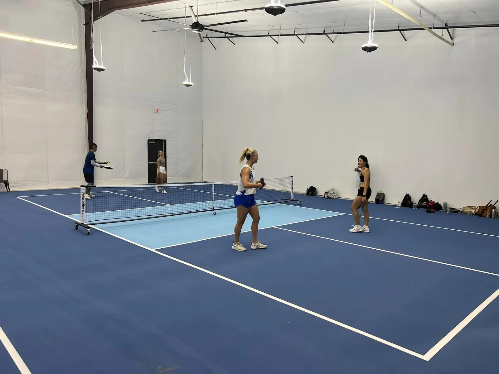 Indoor pickleball courts at Drop Shots in Houston's Heights Farmers Market