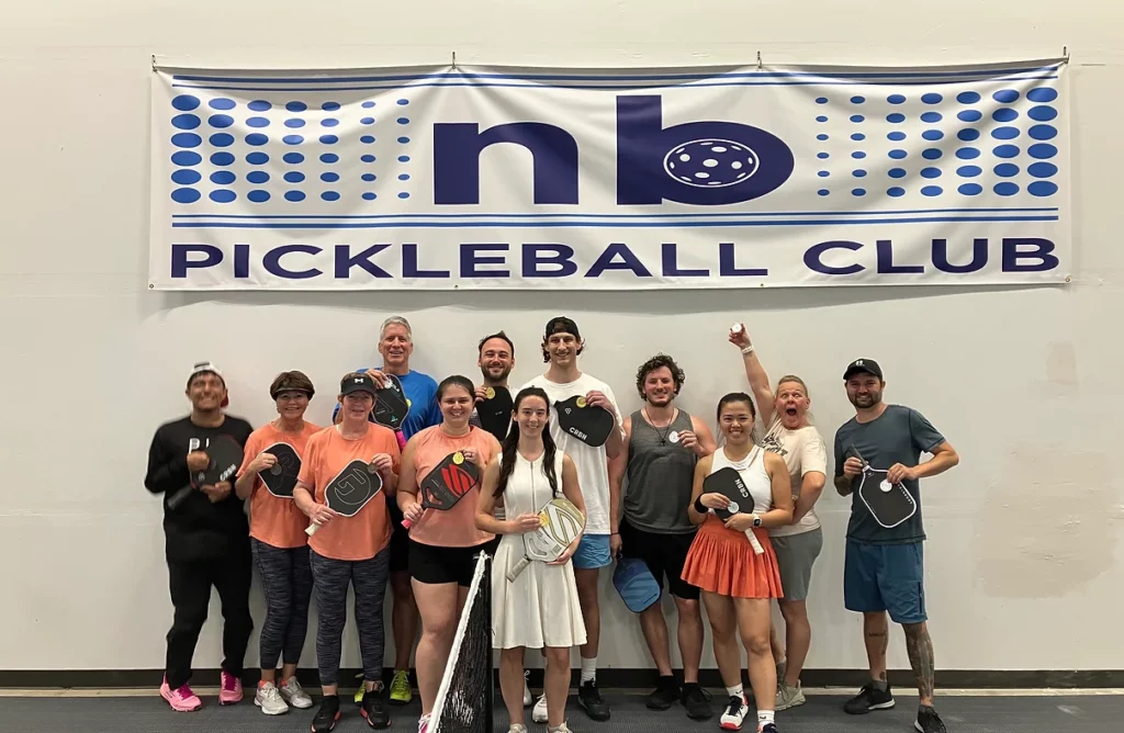 New Braunfels Pickleball Club members playing on indoor courts