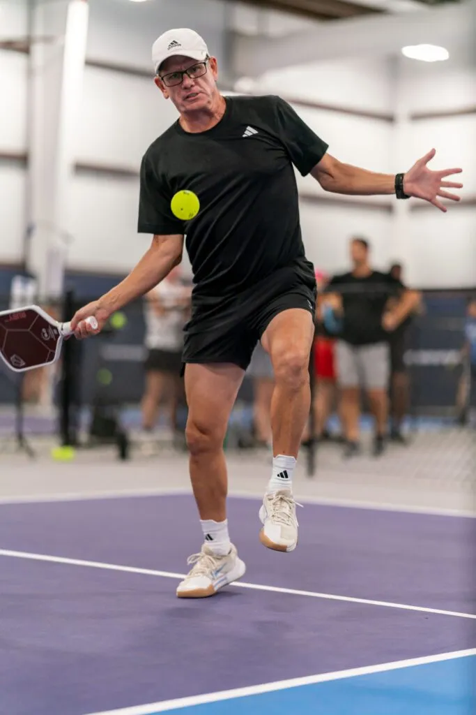 Hand demonstrating the Western pickleball paddle grip for power and topspin