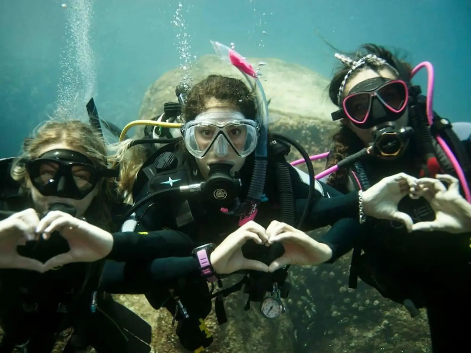 Scuba diver exploring underwater with full diving gear