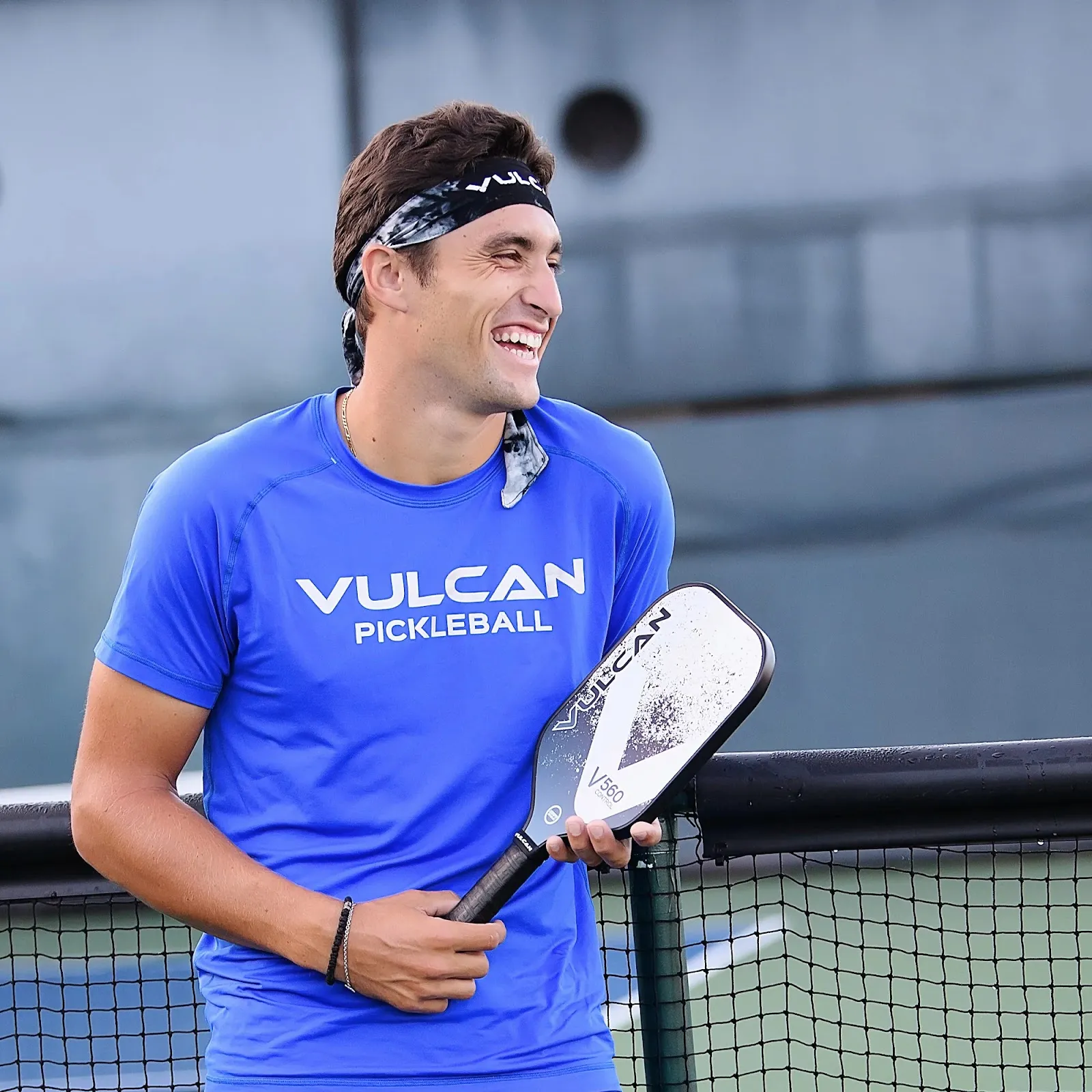 Jocelyn Devilliers holding a Vulcan pickleball paddle