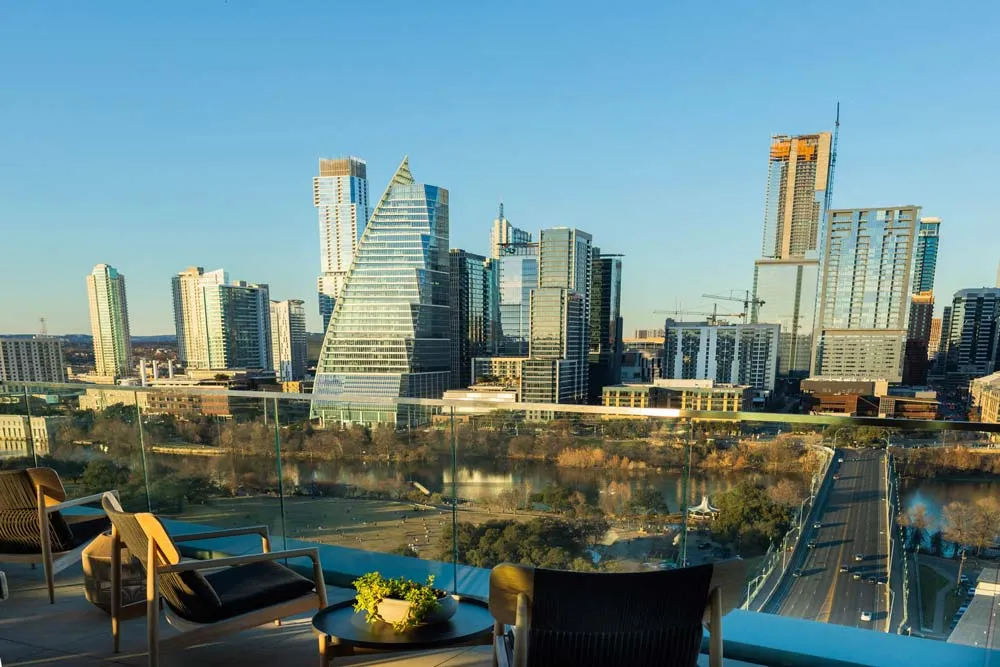 Rooftop view of the Austin skyline and Lady Bird Lake from the Sky Lounge